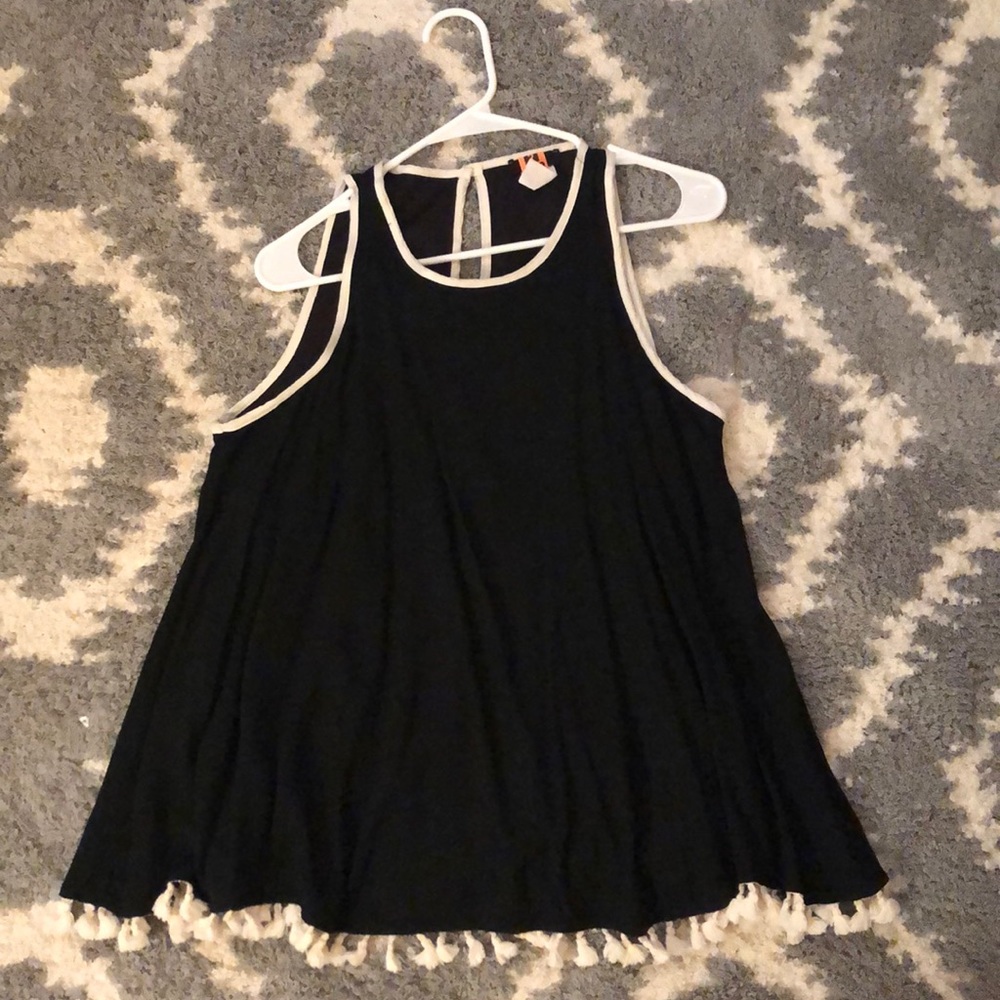 Black dress with white frills on bottom